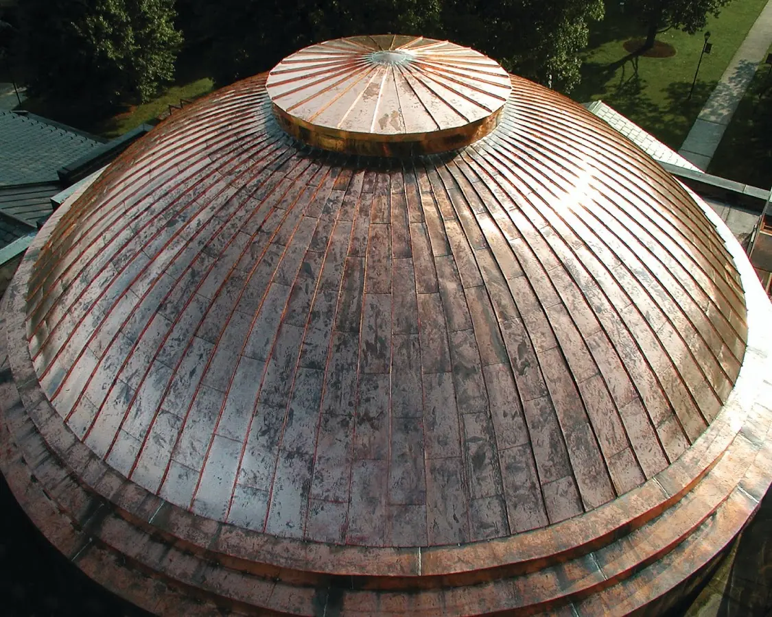 Craftsman Roofing crew installing a new roof in Brewster